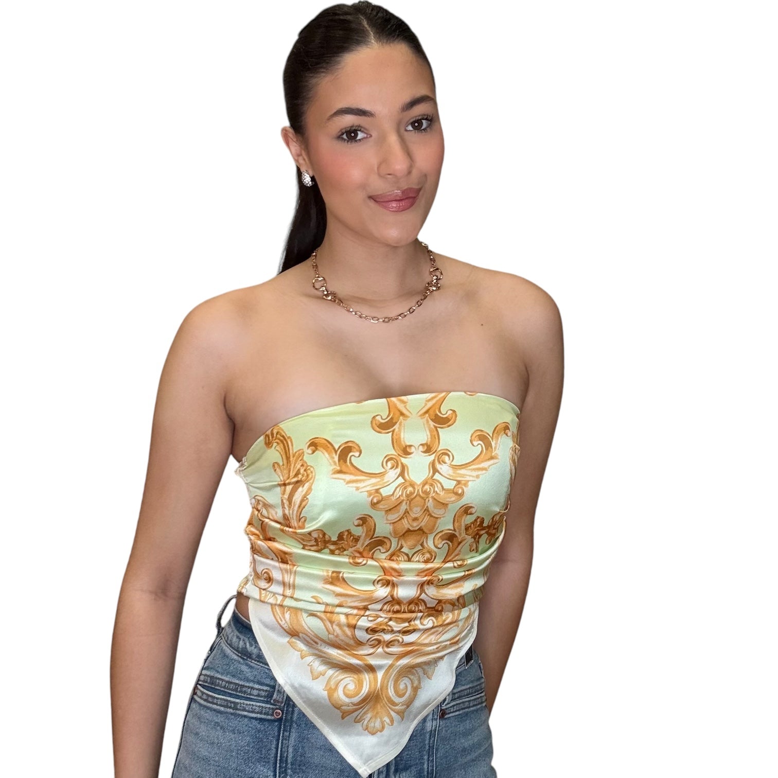 Strapless satin scarf top in lemon with elegant print, styled with high-rise jeans for a chic look.