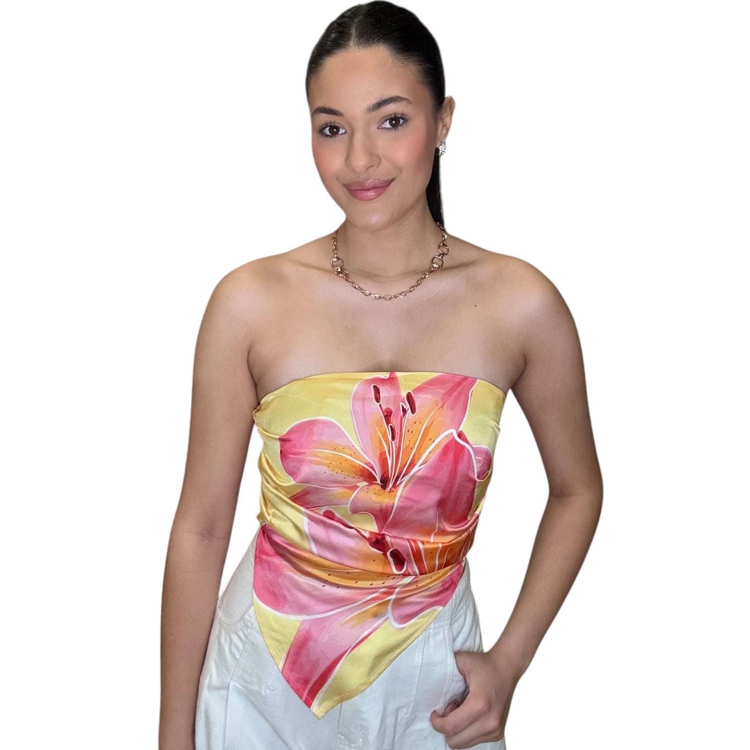 Strapless satin scarf top in pink floral design, featuring an elegant neckline and pleated fabric, perfect for stylish wear.