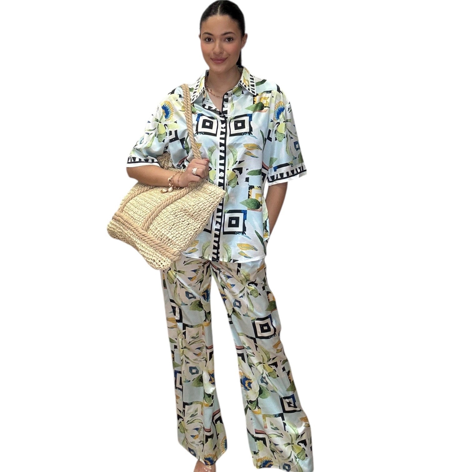 Elegant satin button-down shirt and wide-leg pants set with stylish print, perfect for sophisticated looks.